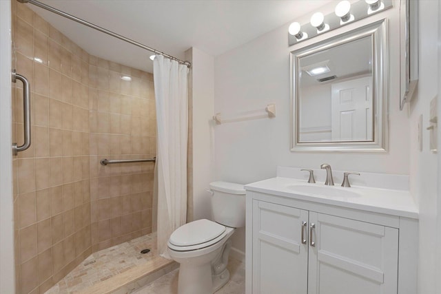 bathroom featuring vanity, a shower with curtain, and toilet