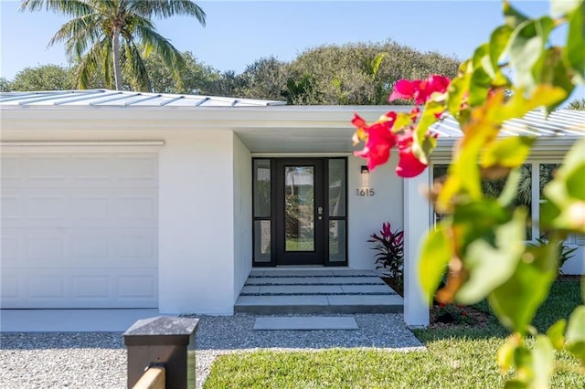 property entrance with a garage