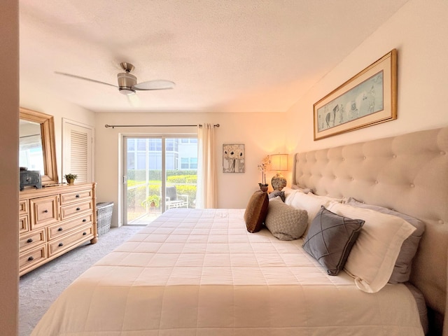 320 Horizons W Unit 103, Boynton Beach, FL 33435 - carpeted bedroom featuring access to exterior and a ceiling fan