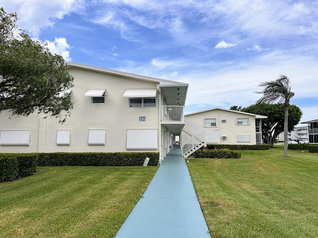 320 Horizons W Unit 103, Boynton Beach, FL 33435 - view of property with stairs