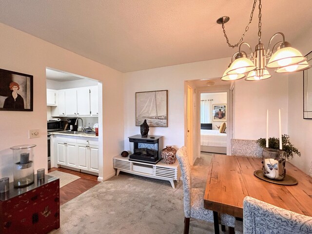 interior space featuring a notable chandelier and sink