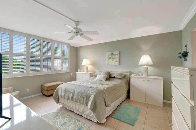 tiled bedroom featuring crown molding and ceiling fan