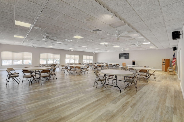 dining area featuring ceiling fan and light hardwood / wood-style floors