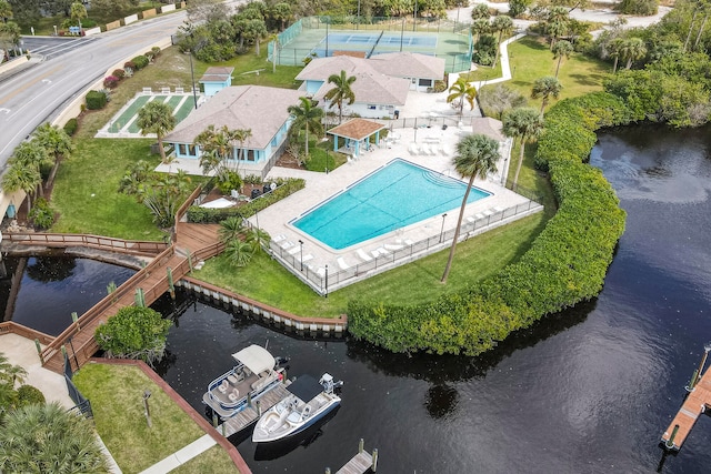 birds eye view of property featuring a water view