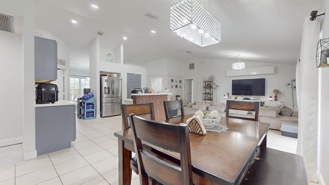 dining space featuring high vaulted ceiling, recessed lighting, light tile patterned flooring, and visible vents