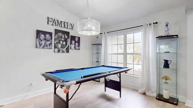 playroom featuring light hardwood / wood-style flooring and billiards