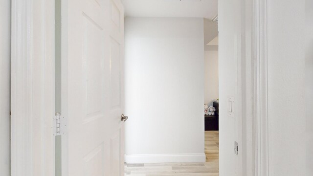 corridor featuring light wood-type flooring