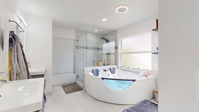 bathroom featuring vanity, separate shower and tub, and tile patterned flooring