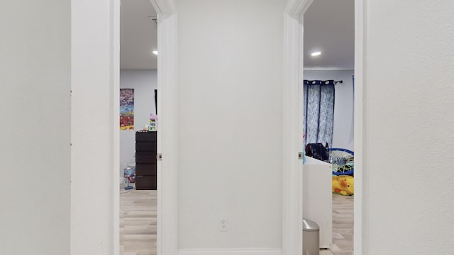 hallway featuring wood finished floors