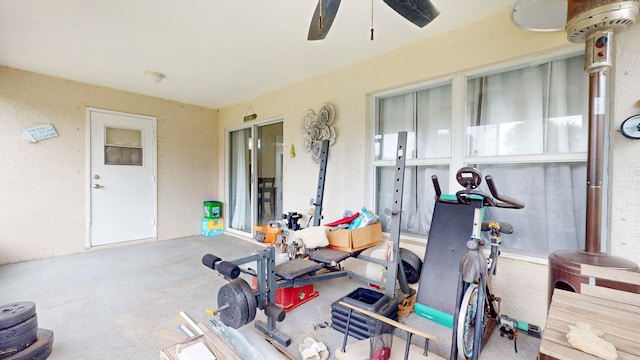 workout area featuring ceiling fan