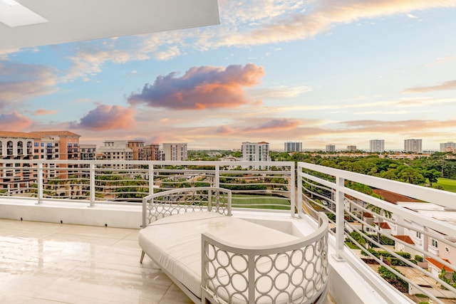 view of balcony at dusk