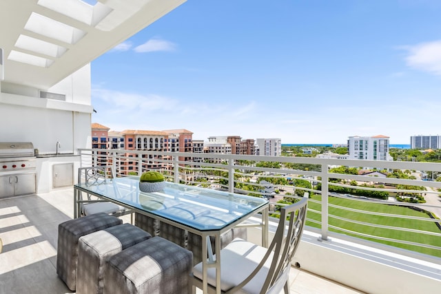 balcony featuring area for grilling