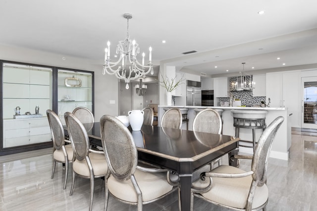 dining room featuring an inviting chandelier