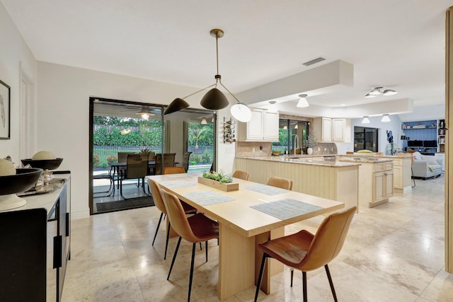 dining room featuring sink