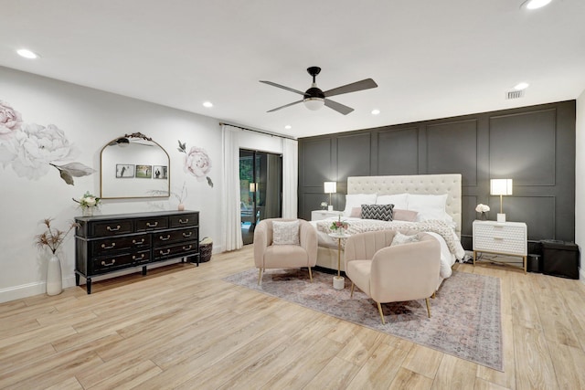 bedroom with ceiling fan and light wood-type flooring