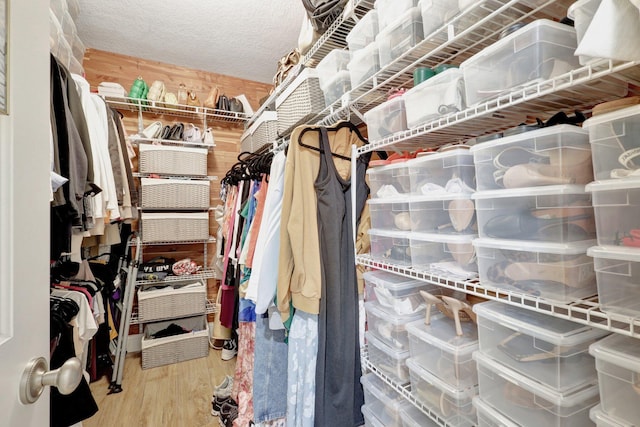 walk in closet featuring hardwood / wood-style floors