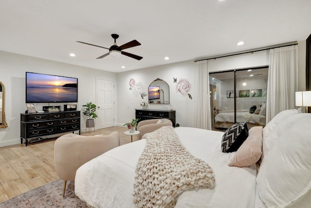 bedroom with ceiling fan, access to exterior, and light wood-type flooring