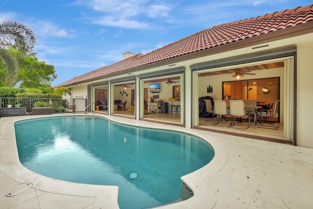 view of pool featuring a patio area