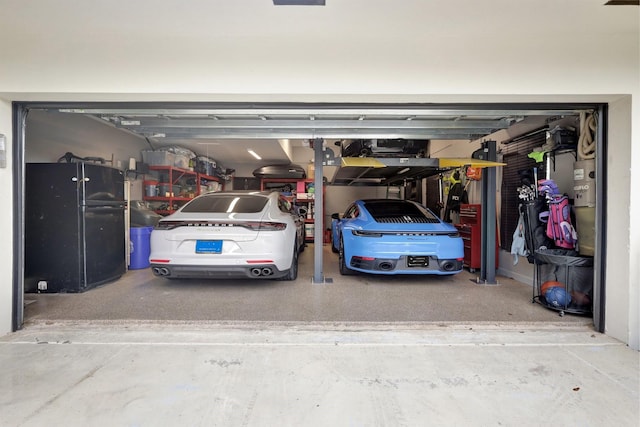 garage with black refrigerator