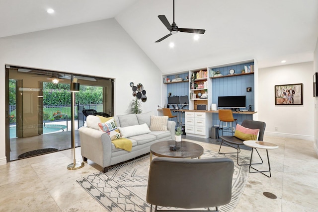 living room with ceiling fan, built in desk, and high vaulted ceiling