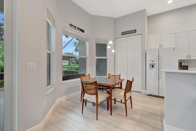 dining room featuring light hardwood / wood-style floors