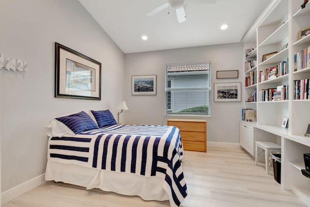 bedroom with ceiling fan and light hardwood / wood-style floors