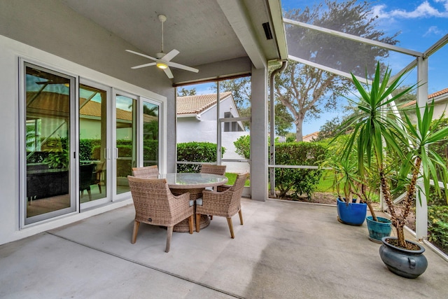 sunroom / solarium with ceiling fan