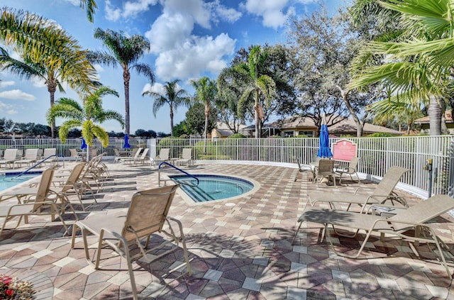 view of pool featuring a patio area