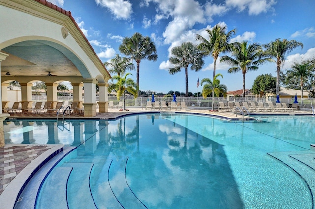 view of pool with ceiling fan