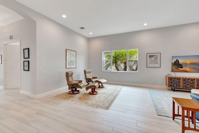 sitting room with light hardwood / wood-style flooring