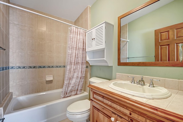 full bathroom featuring shower / tub combo, vanity, and toilet