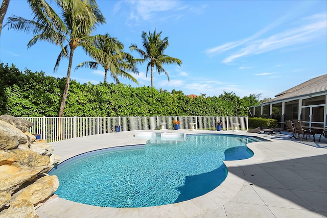 view of swimming pool featuring a patio area