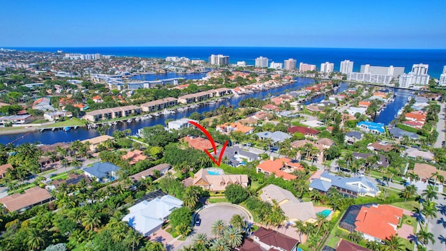 drone / aerial view with a water view