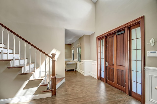 foyer featuring hardwood / wood-style flooring and a wealth of natural light