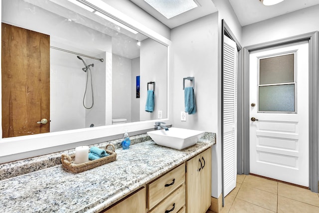 bathroom with vanity and tile patterned floors