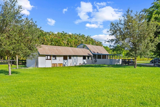 view of front of property with a front lawn