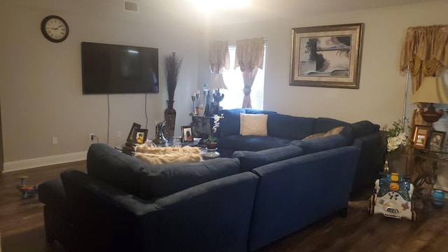 living room featuring dark hardwood / wood-style flooring