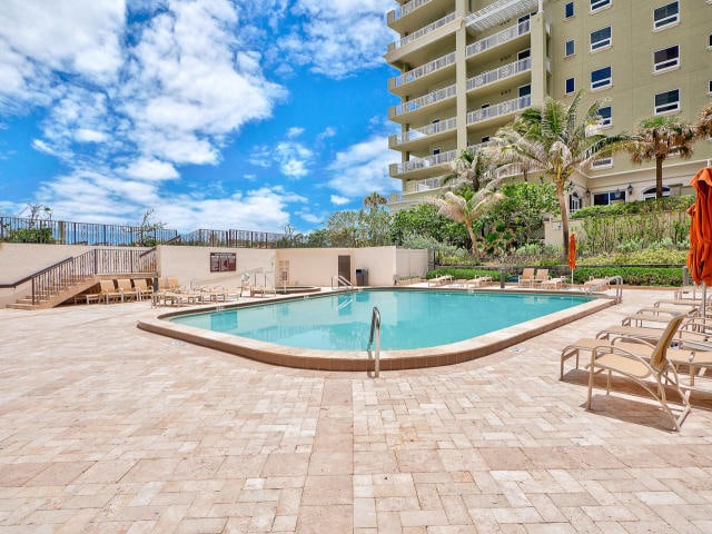 view of pool featuring a patio