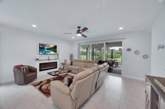 living room featuring ceiling fan