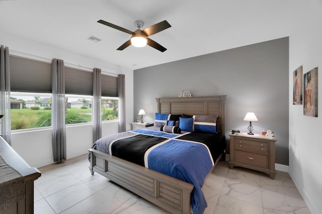 bedroom featuring ceiling fan