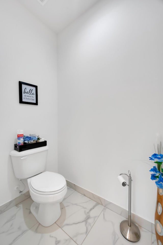 bathroom featuring toilet