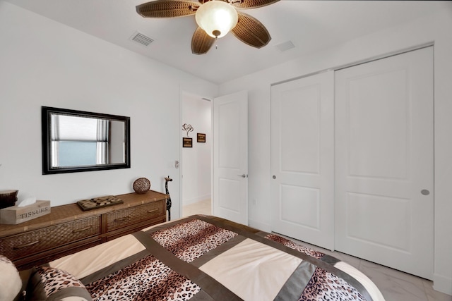 bedroom featuring a closet and ceiling fan