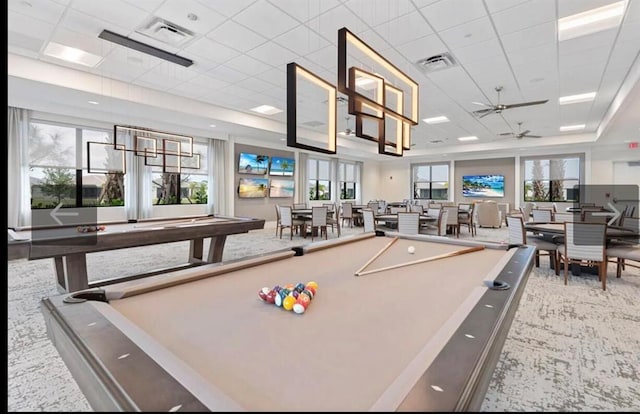 rec room with a paneled ceiling, ceiling fan, and billiards