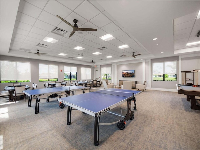 game room with carpet flooring, a wealth of natural light, and ceiling fan