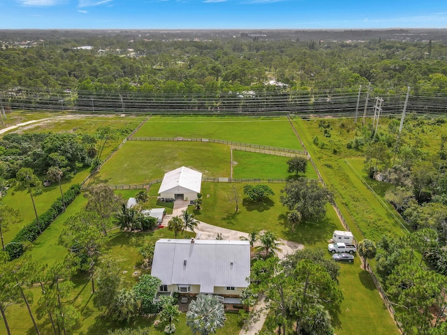 birds eye view of property featuring a rural view