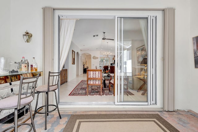 dining space with a chandelier