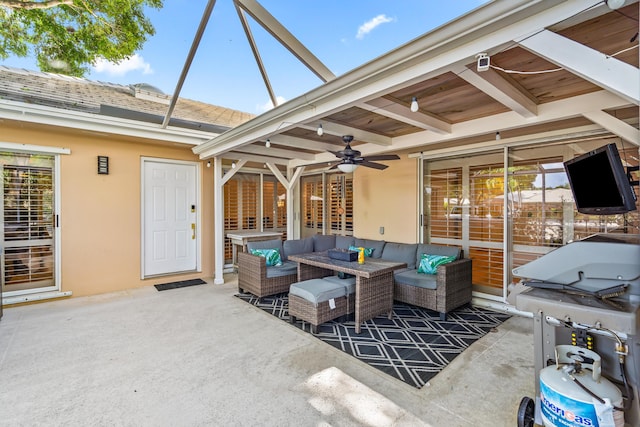 view of patio / terrace with an outdoor living space and a ceiling fan