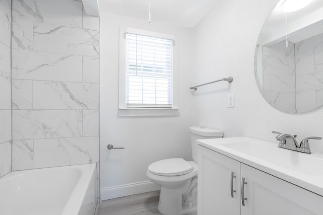 full bathroom featuring a healthy amount of sunlight, vanity, toilet, and hardwood / wood-style floors