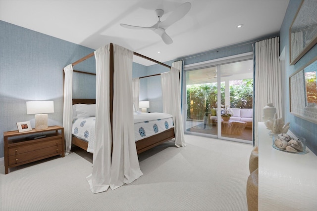 bedroom with ceiling fan, light carpet, and access to outside