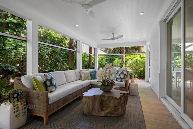 sunroom / solarium with ceiling fan and a wealth of natural light